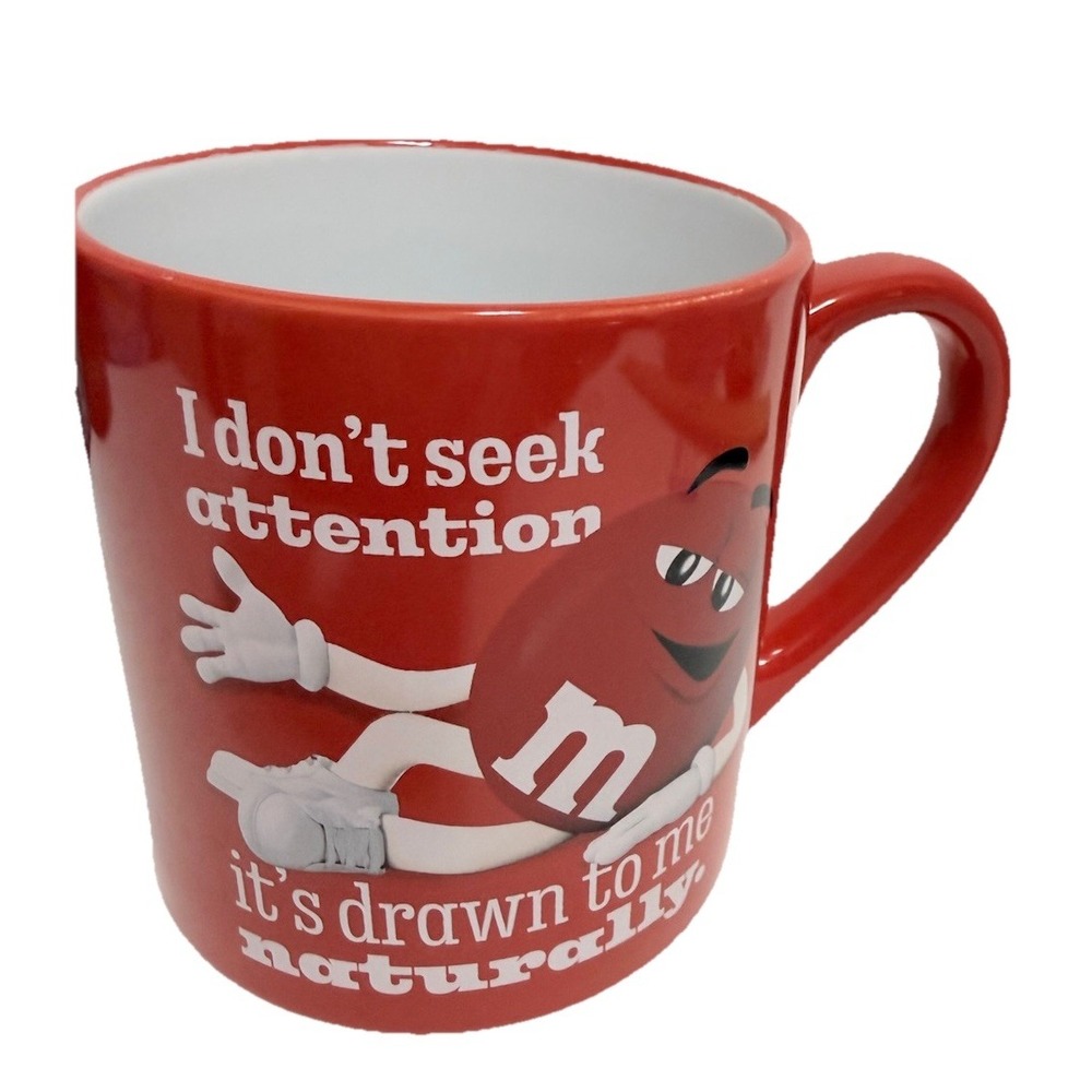2023 Mars Red M&M I Don't Seek Attention It's Drawn Naturally Coffee Cup Mug 4"